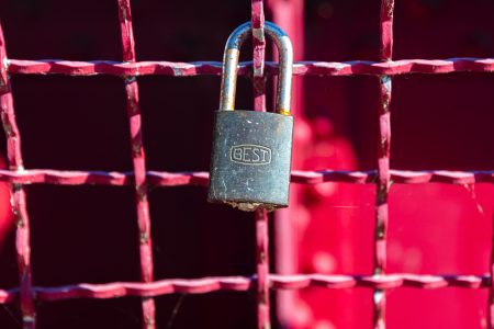 a padlock on a gate